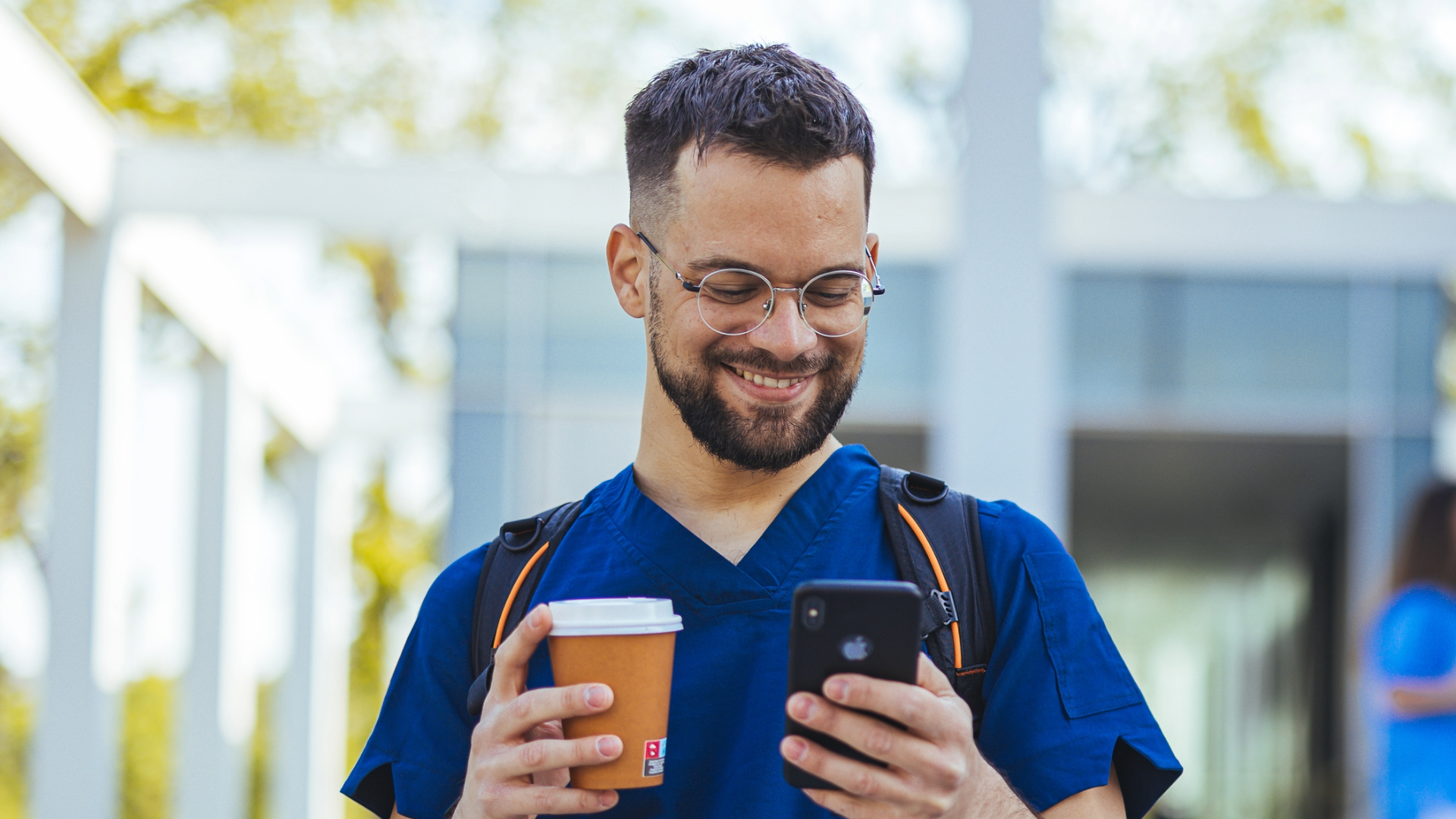 radiographer on the phone receiving job offer