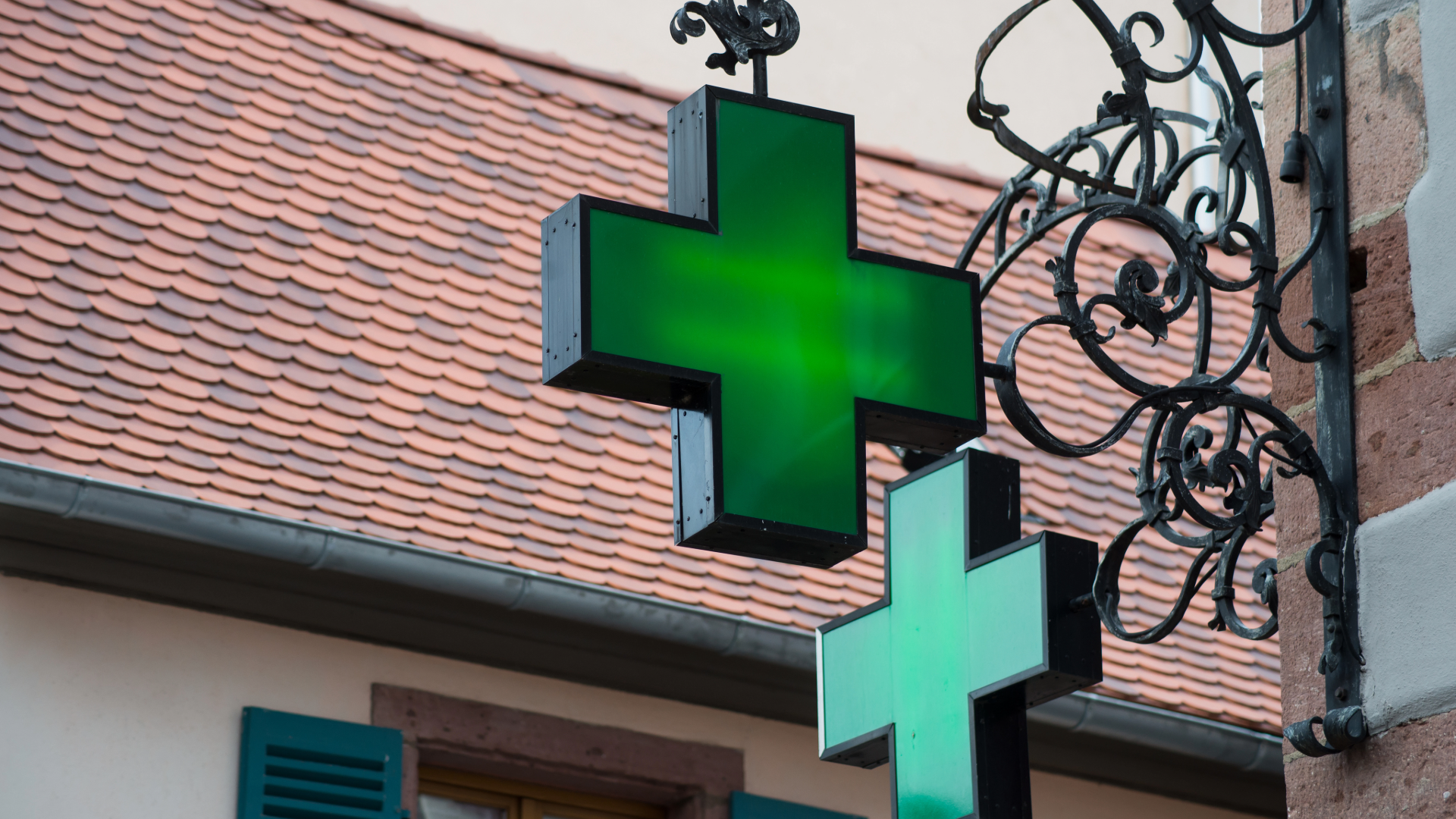 Pharmacy cross sign outside a community store